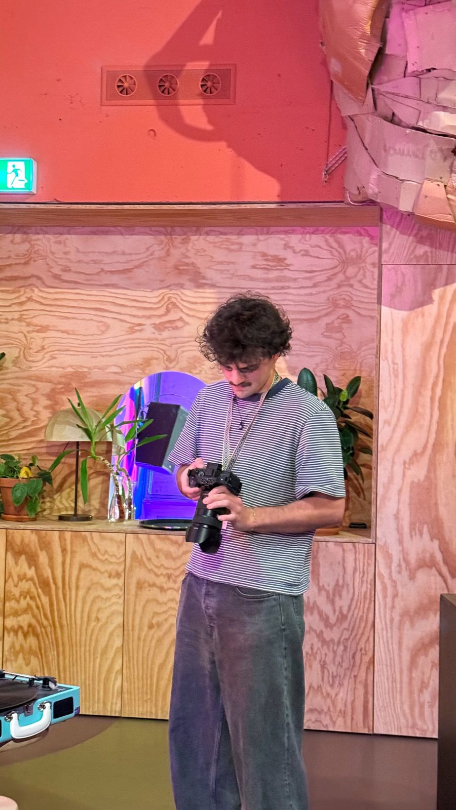 Damiano checking a shot on his camera